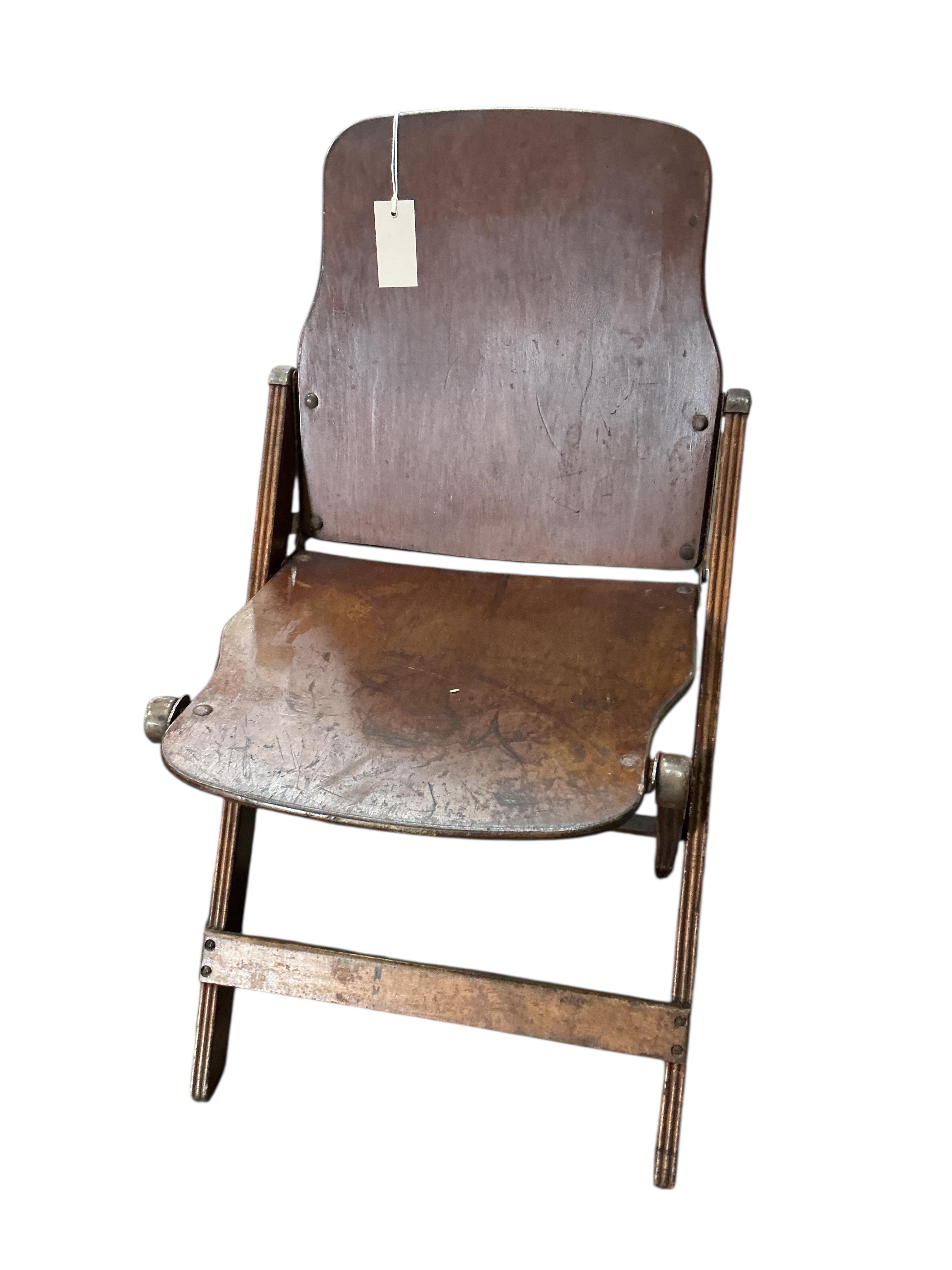 A pair of US administrative folding chairs, India, width 43cm, depth 39cm, height 76cm